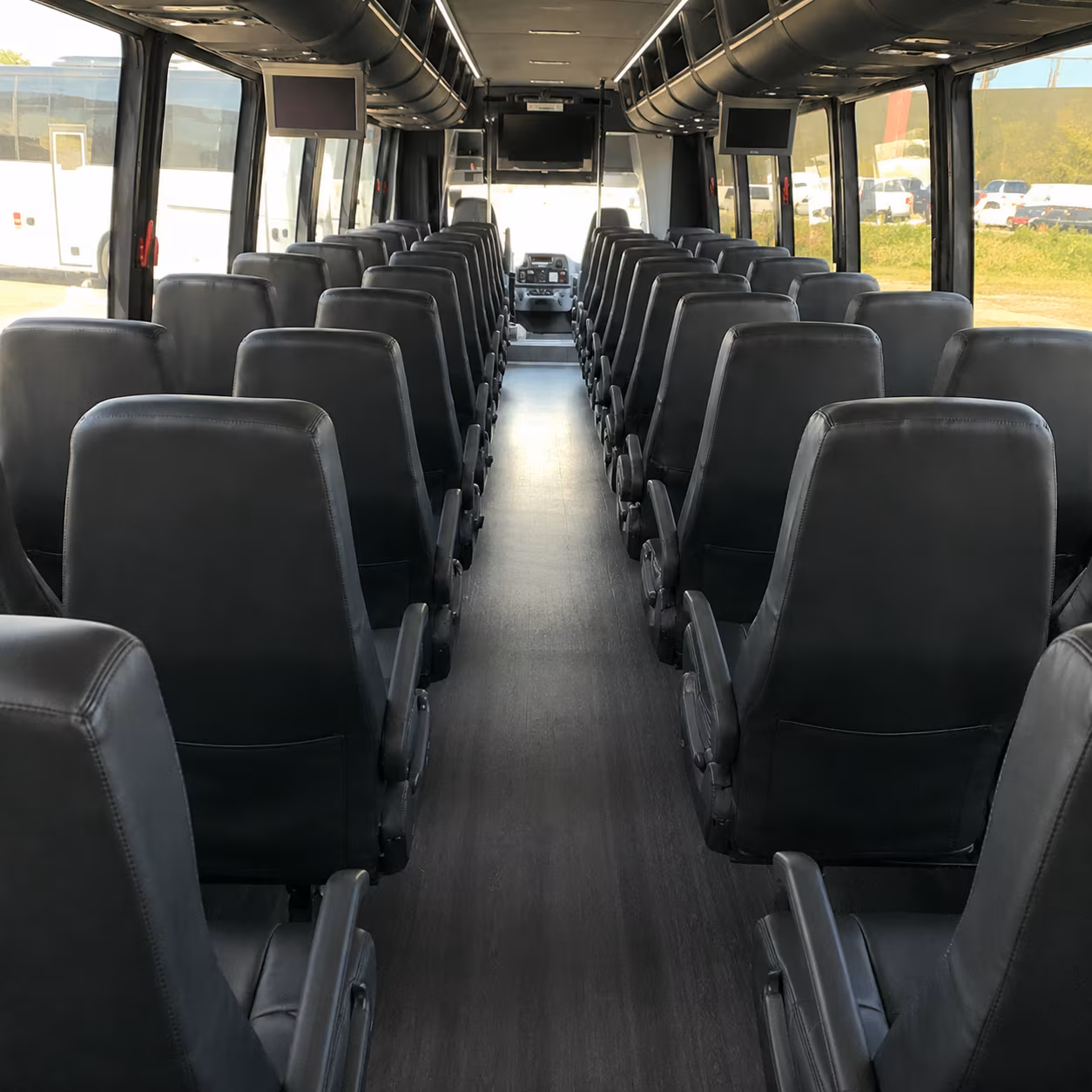 group bus transportation to college sporting events around newton
