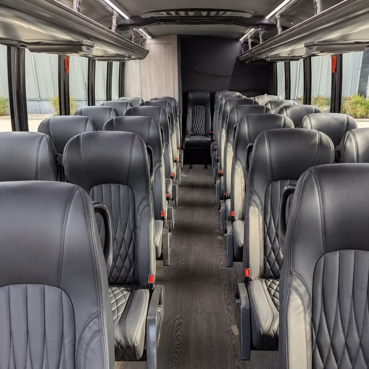 how is a bus rental actually priced in newton massachusetts